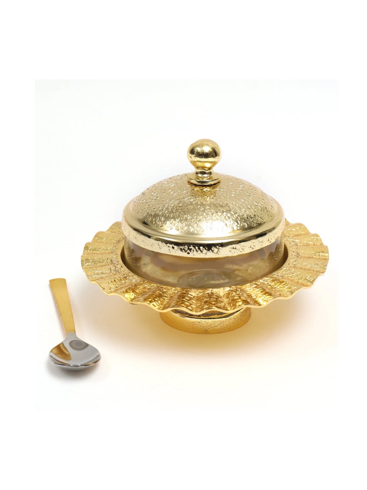 Versatile glass jar with stainless steel gold lid and matching spoon. Ideal for sugar, honey, jam. Measures 6W x 5H inches.