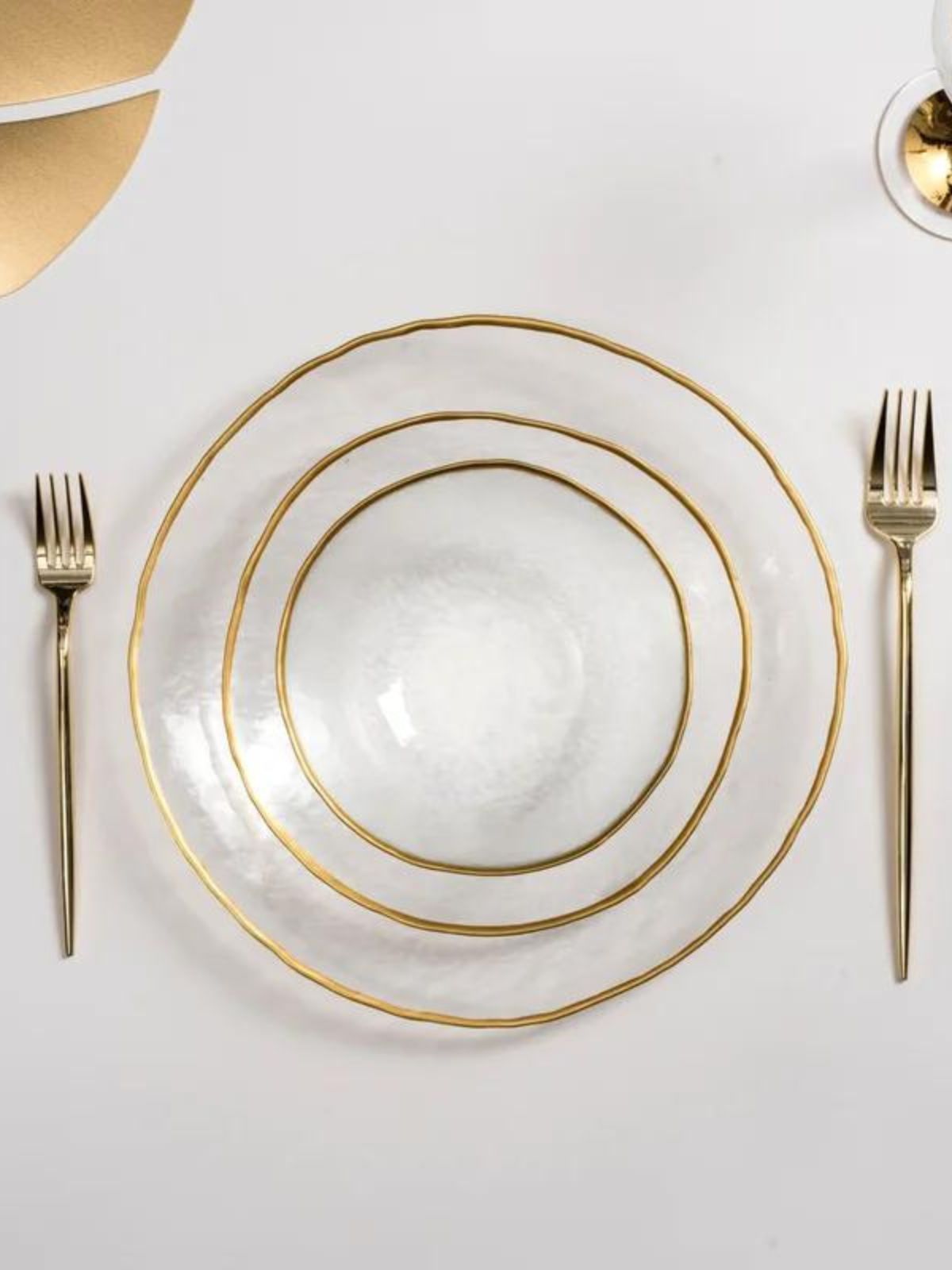 12 Piece Dinnerware Set were constructed out of fine Alabaster glass material and decorated with a bold gold-tone trim.