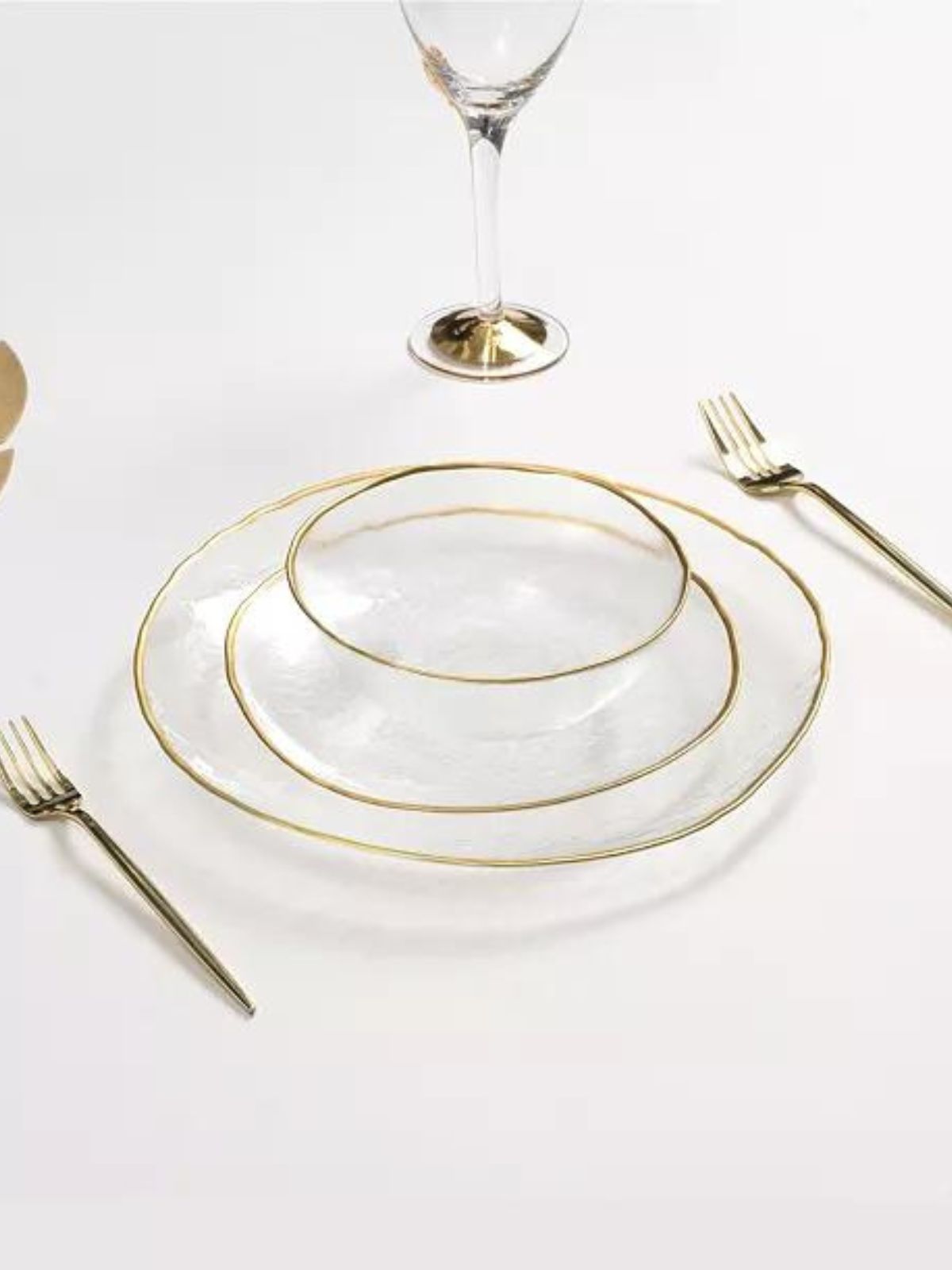 12 Piece Dinnerware Set were constructed out of fine Alabaster glass and decorated with a bold gold-tone trim.