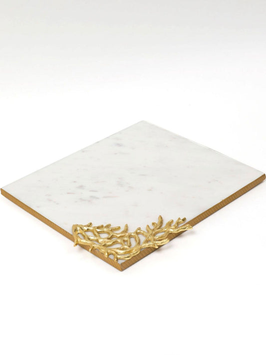 This Luxurious Rectangular Marble tray has a pristine white slab with gold branch on the corner.