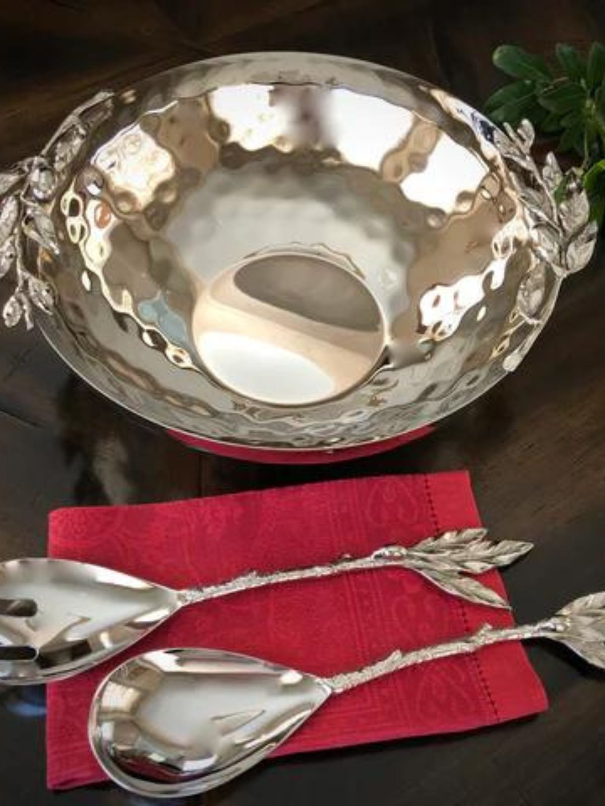 14D inch Stainless Steel Serving Bowl Features hammered textures with olive designs on the edges.