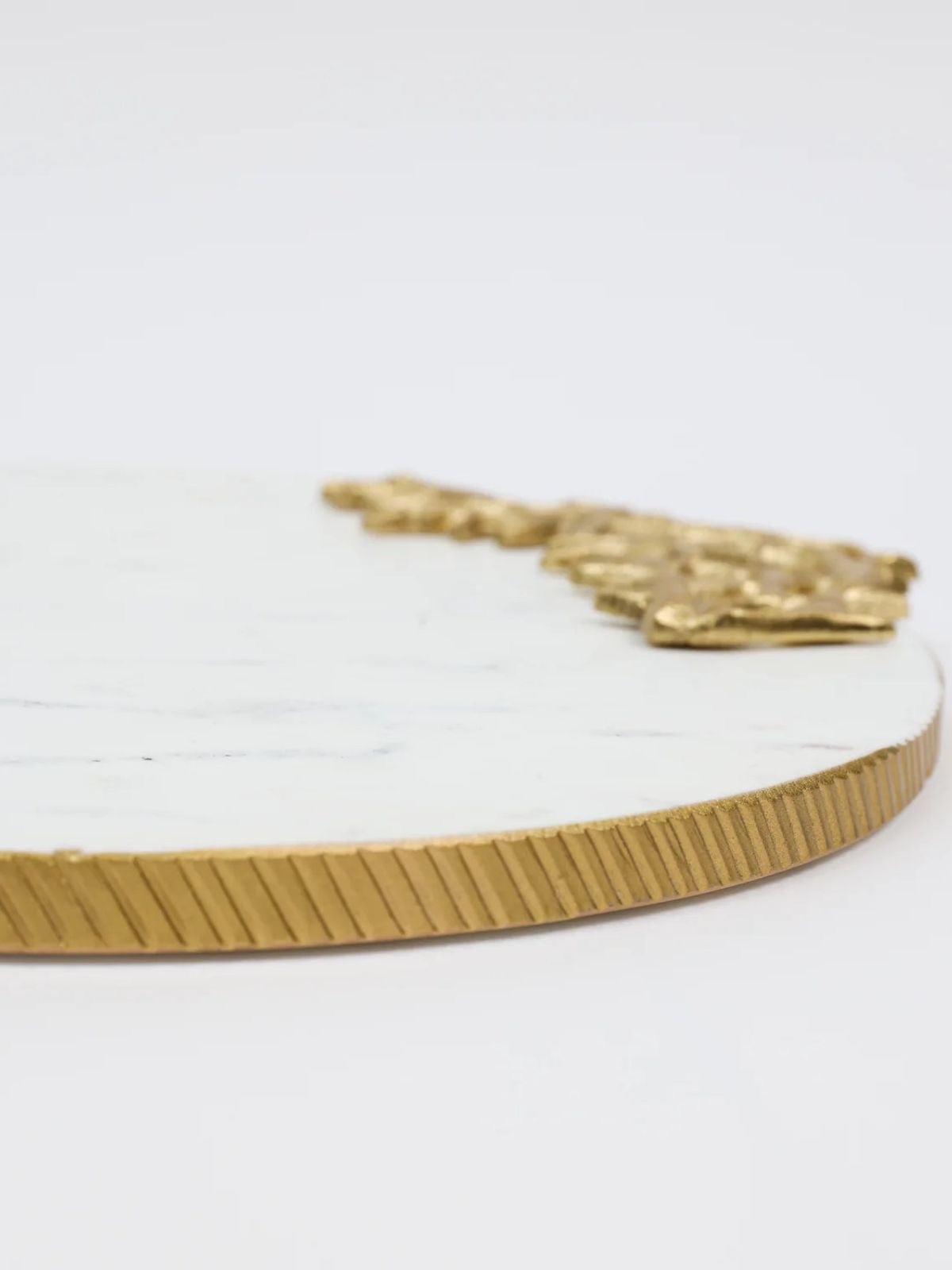 The Nicole Marble round marble tray is perfect to use as a charcuterie board or serving platter. Place candles on or use to style any vignette in your home!