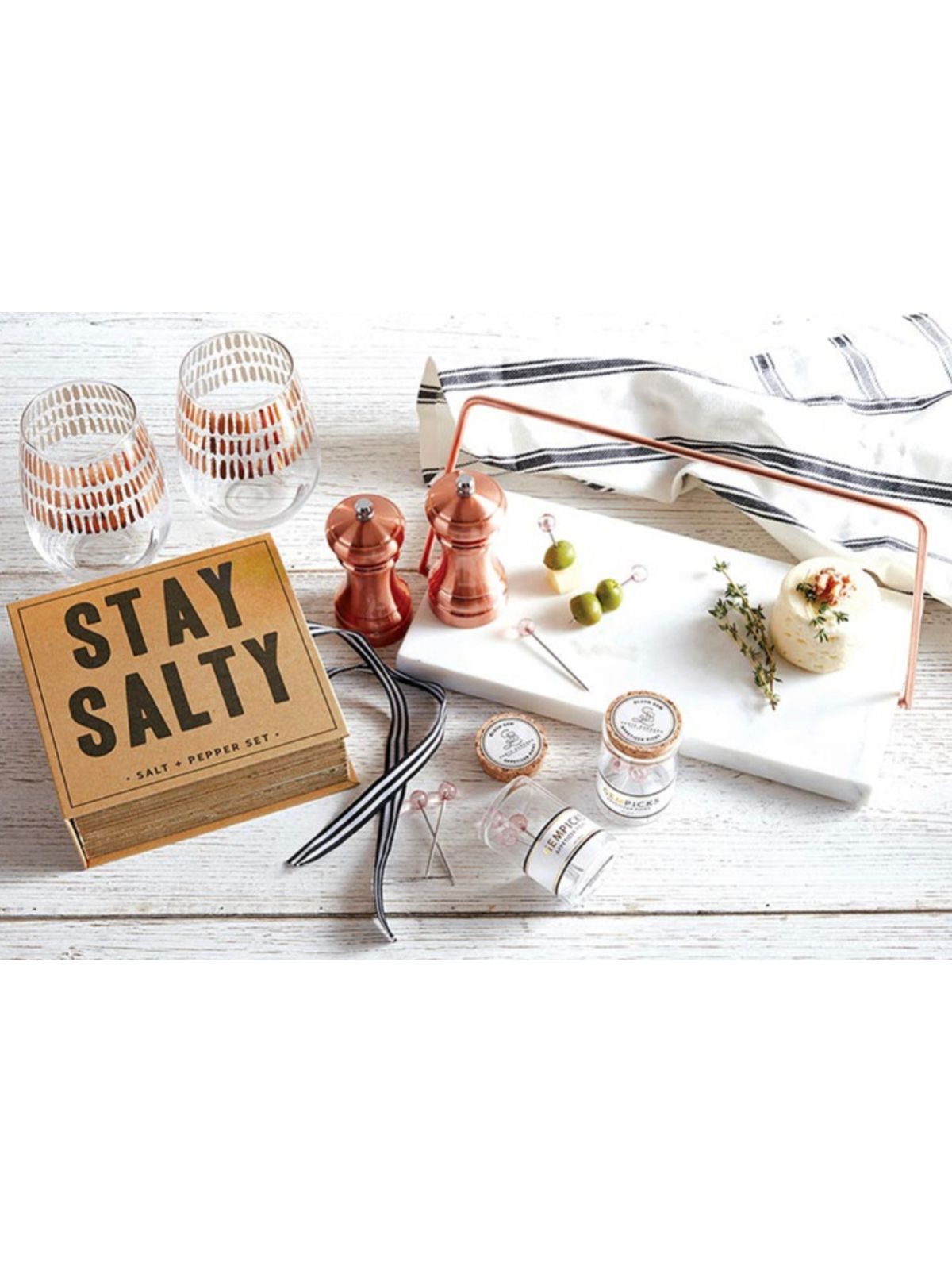 This Unique 12 inch rectangular marble and rose gold iron plate provides a clean presentation of your favorite desserts and appetizers. Sold by KYA Home Decor