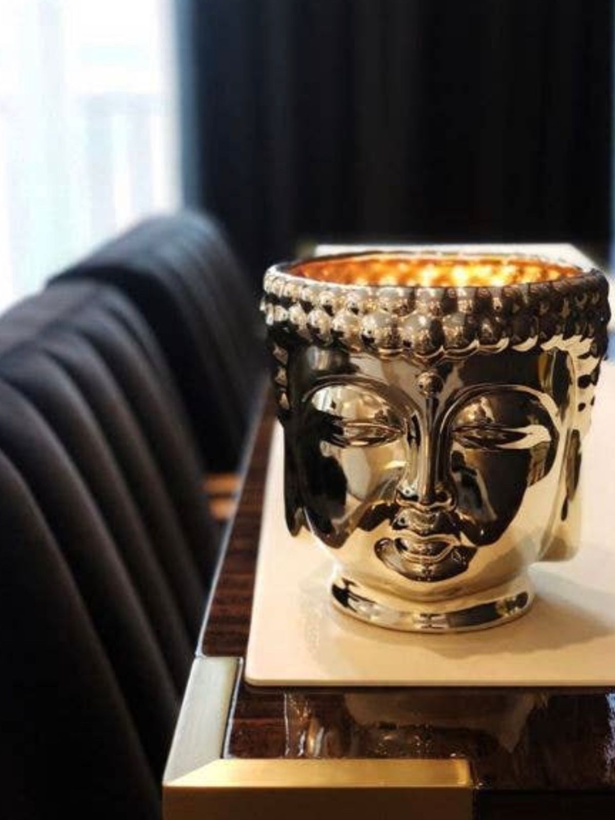 This Metallic Buddha scented candle is hand-sculpted and hand-poured in the USA with only the finest essential oils.