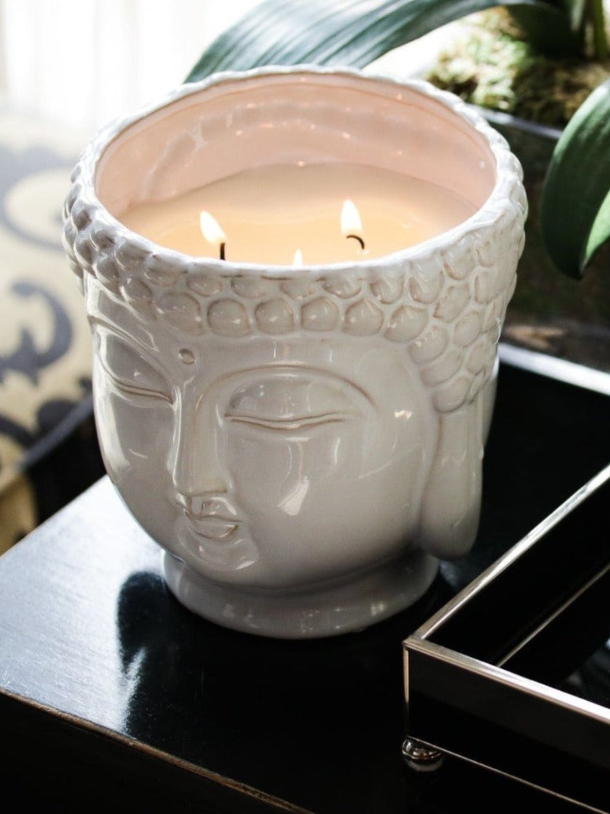 This White Buddha scented candle is hand-sculpted and hand-poured in the USA with only the finest essential oils.