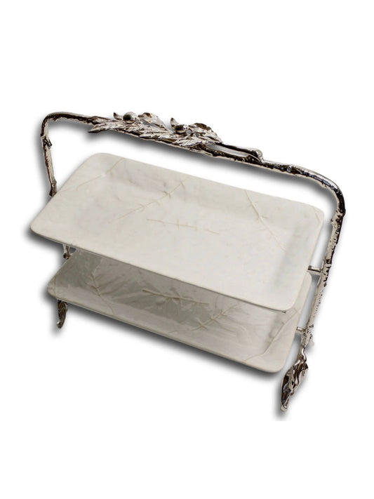 14L buffet stand with silver stainless steel frame and raised olive branch design that holds 2 6x12 white stoneware trays.