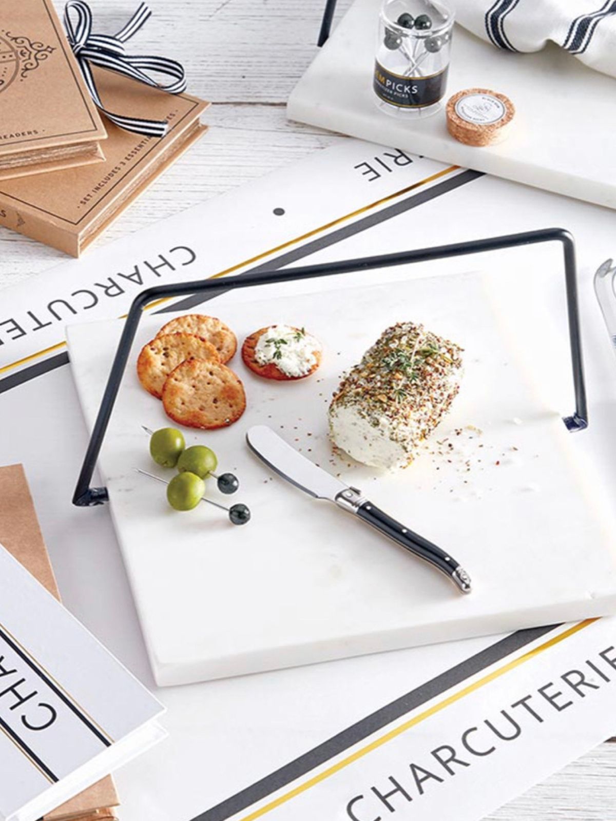 This Unique 10 inch squared marble and black gold iron plate provides a clean presentation of your favorite desserts and appetizers. Sold by KYA Home Decor