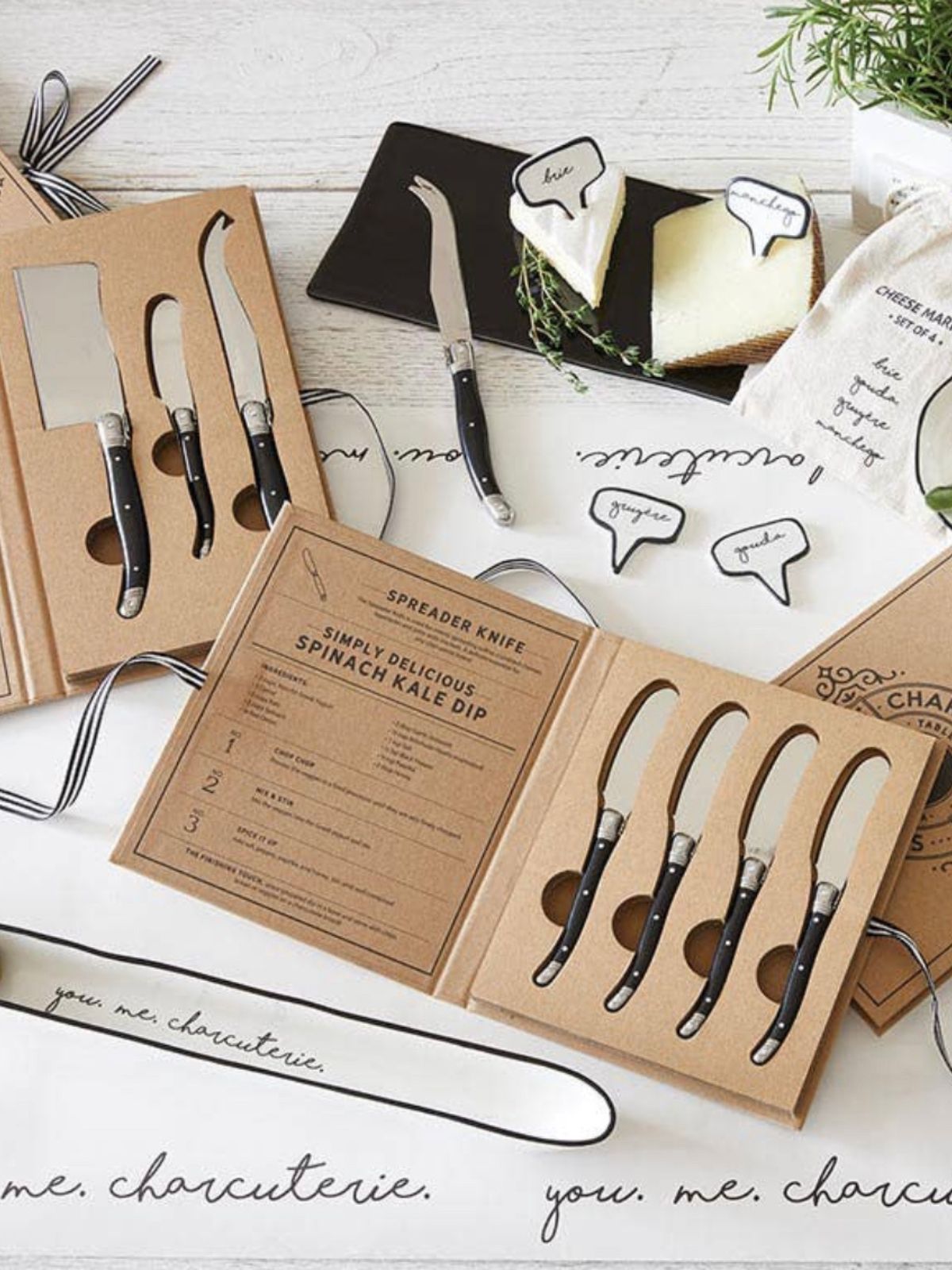 Gather up the tools needed to create your own charcuterie board with this set of essentials spreader knives made from stainless steel in Corrugated cardboard box sold by KYA Home Decor.