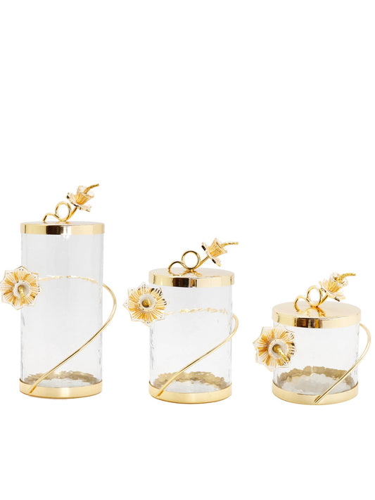 The Rose of Sharon Glass Canister with Gold Lid and  Enamel Flower Design on Knob has an elegant and decorous design.