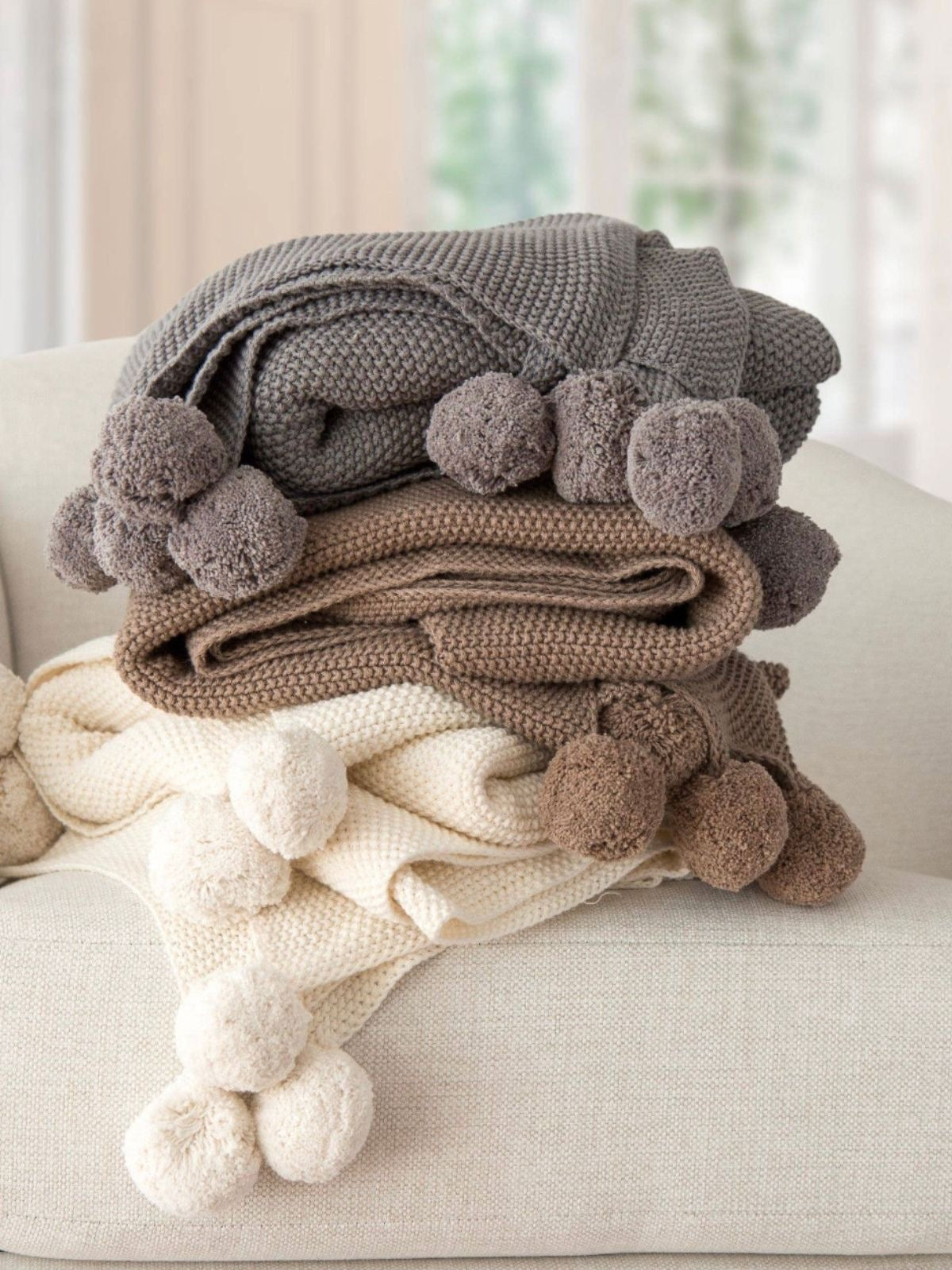 100% Cotton Seedstitch Throw Blanket with Pom Poms Available in 3 Luxurious Colors, 50W x 60L.