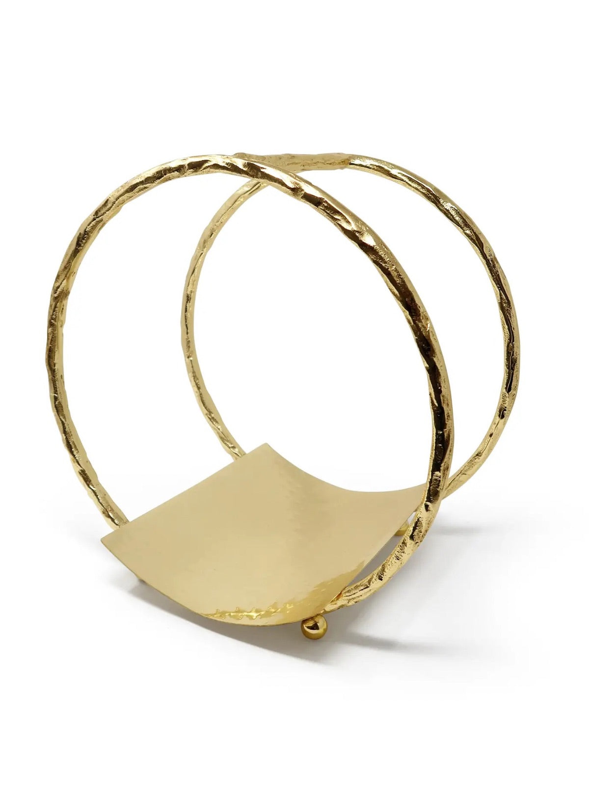 Sleek gold brass magazine rack with a modern design, featuring open slots for holding magazines or newspapers.