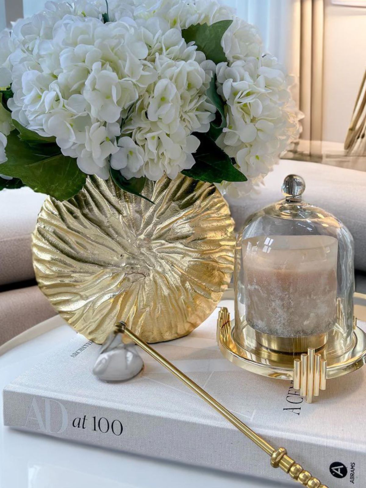Gold round luxury vase with a stunning textured metal finish, perfect vase for faux flowers. Product Measures, 9.5L x 3.25W x 8.25H inches.