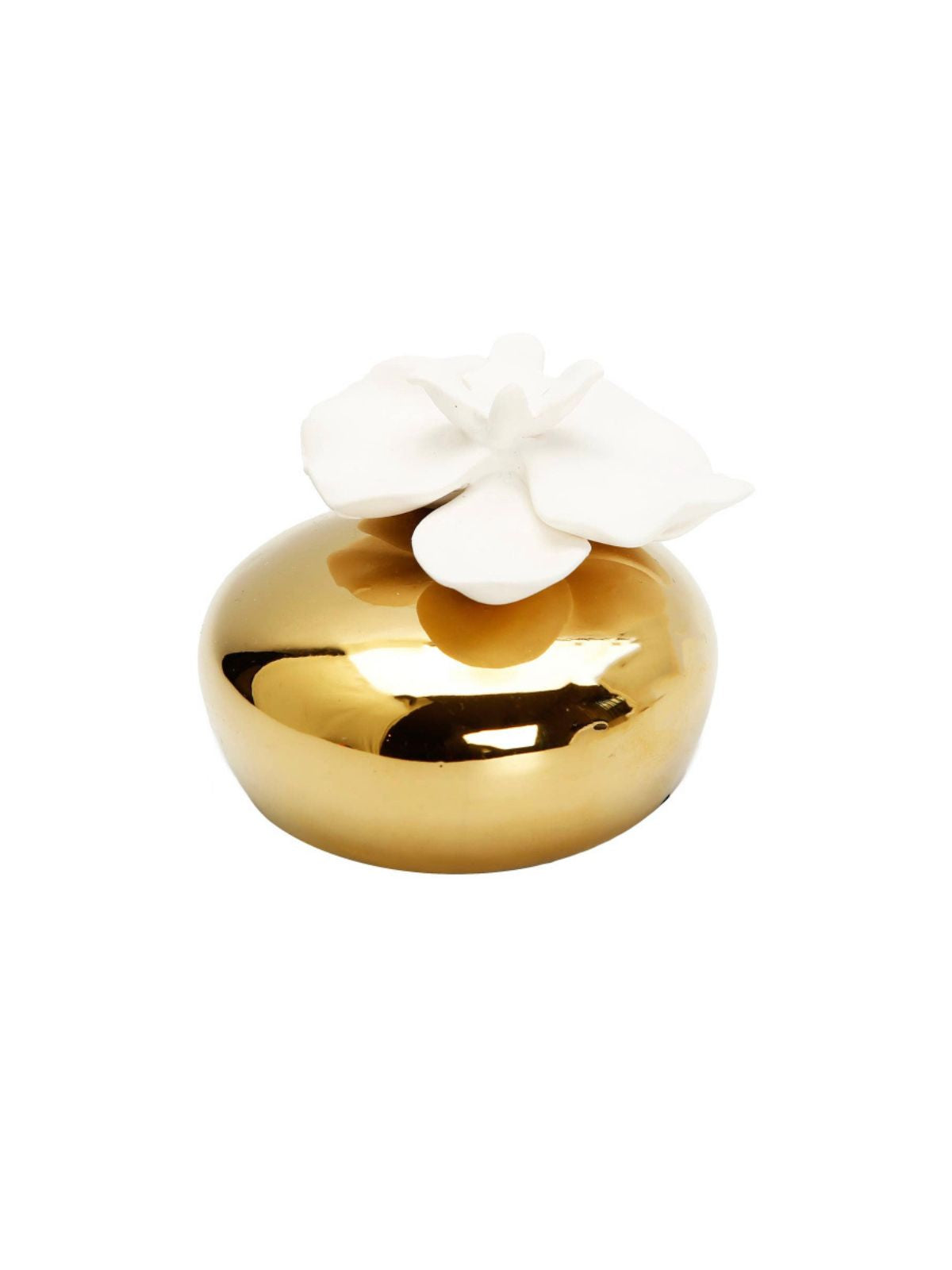 Matte gold ceramic diffuser with a white magnolia flower top that dispenses a luxury fragranced oil of Iris and Rose scent. 