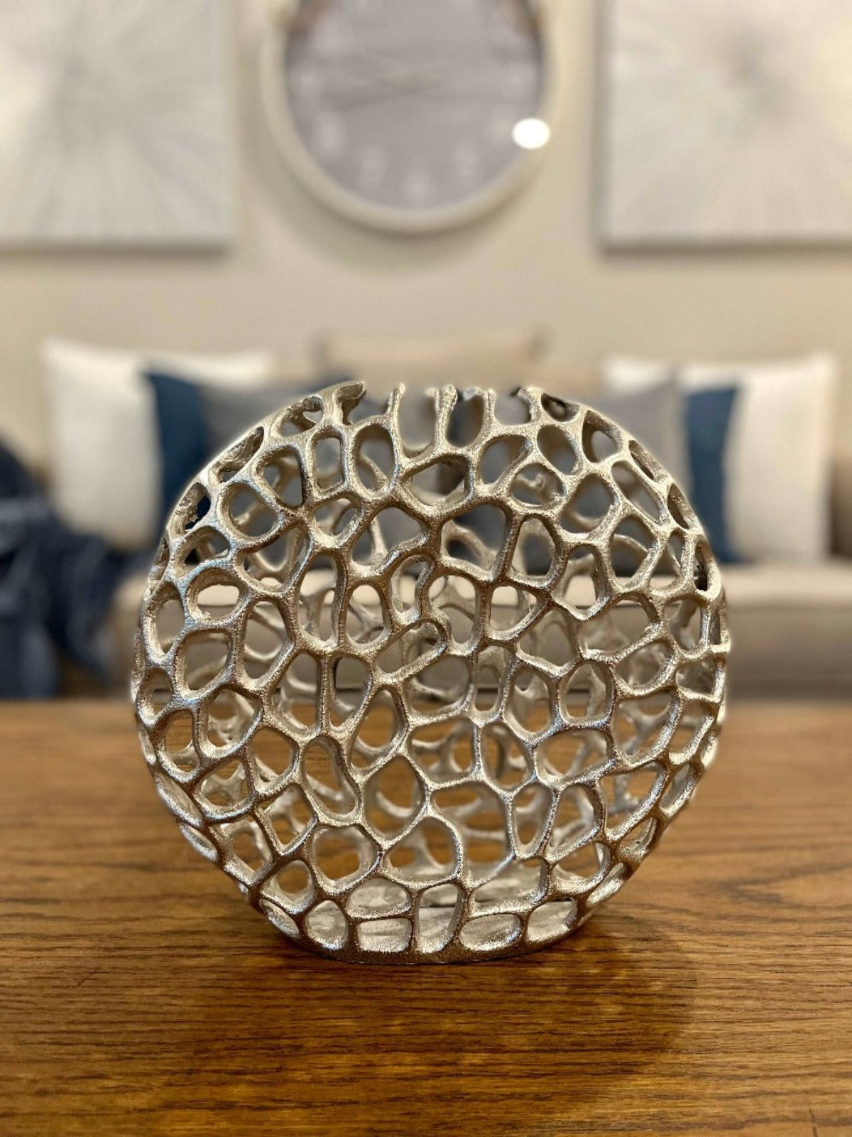 The Round Corallo Table Vase makes a Statement on a Shelf or Table. Natural Open Unique Design and Shiny Nickel Finish make this Vase a winner in any Contemporary Decor. 
