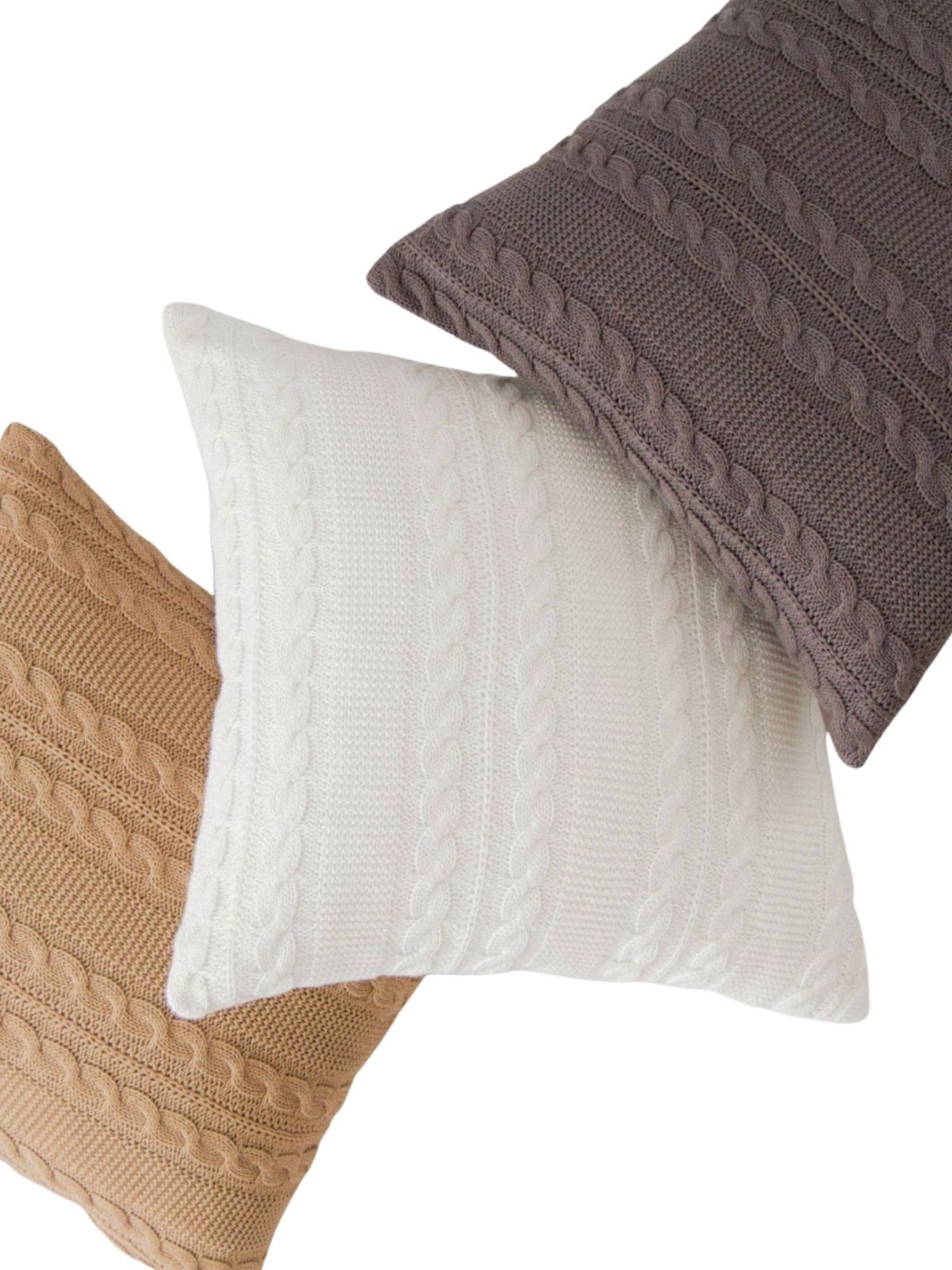 This 100% cotton cable-knit pillow is lightweight for that perfect cozy vibe and yarn-dyed for a lasting rich color. Measuring 18x18 and Available in 3 colors sold by KYA Home Decor 