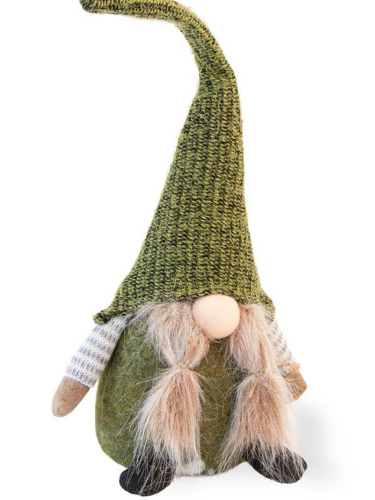 Bring festive charm to your decorating space with this home accent Kiaria the gnome features plush green hat and fuzzy pigtails.