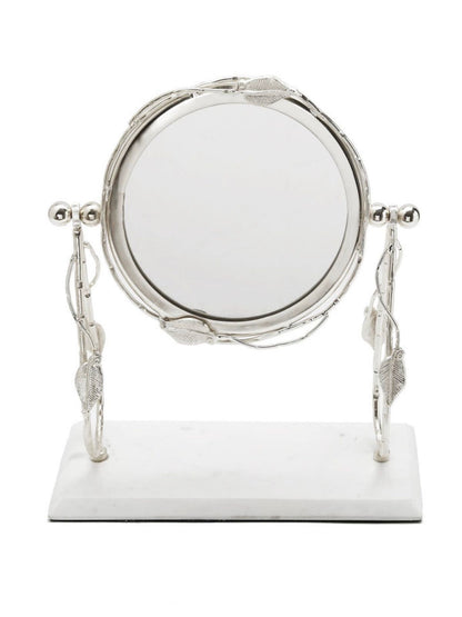 Round Table Mirror with Silver Leaf Design on Marble Base sold by KYA Home Decor.