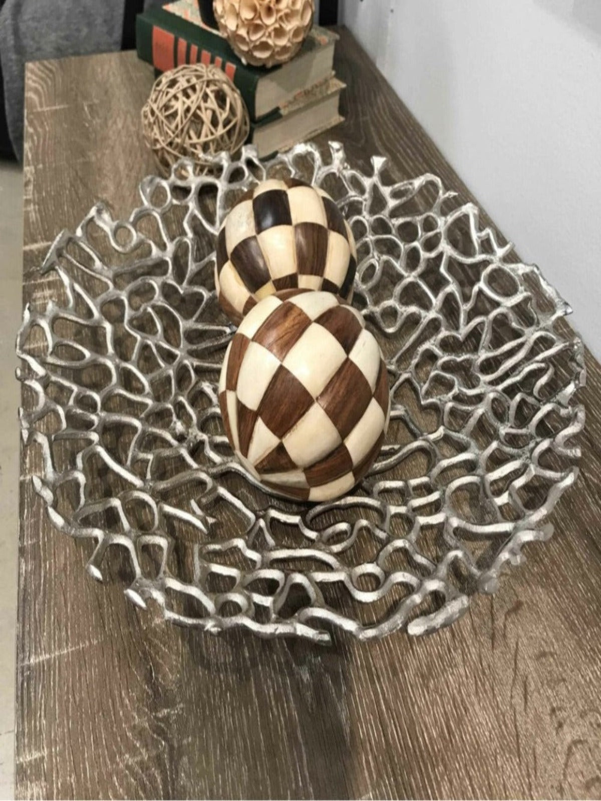The Corallo Round Coral Plate is an enticing Accessory. Made of Cast Aluminum in an Open Connected Coral Design. Finished in Matte Silver this Plate is a great addition to Modern and Transitional Decor.