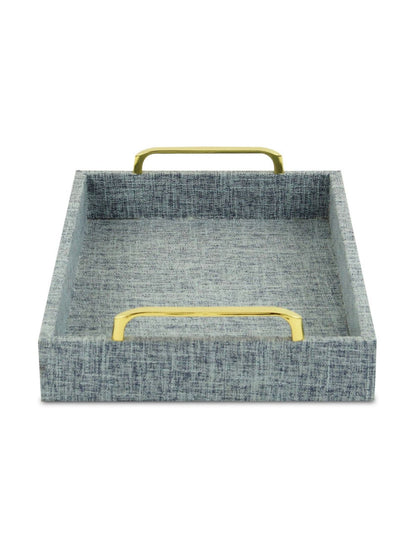 The Isola Di Canter Linen Tray in Light Blue is an entirely handmade and hand-crafted design that blends an engineered wood frame with a linen outer fabric and metal hardware.