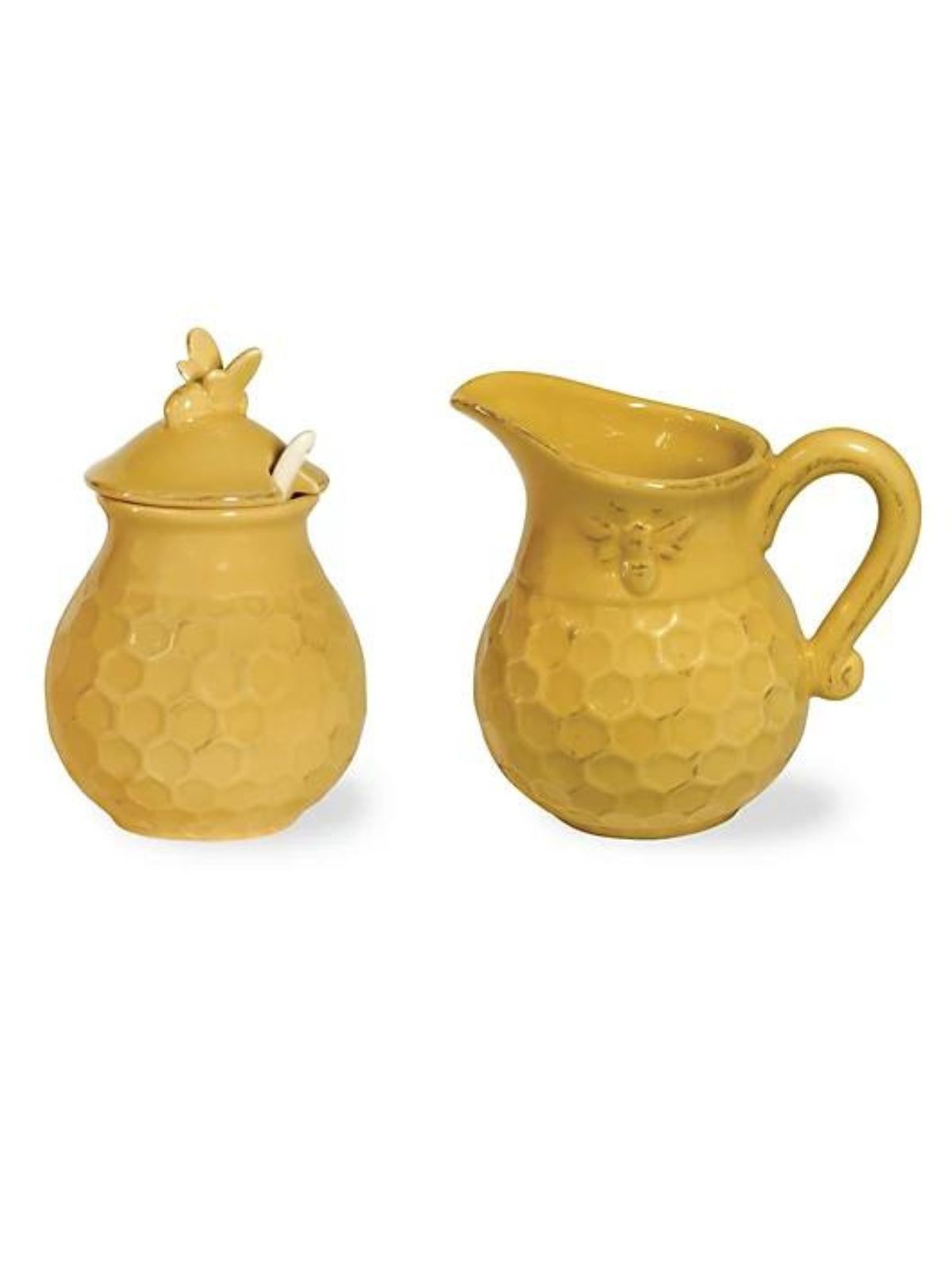 Make a bold statement at any meal with charming Honeycomb set. Crafted in durable ceramic, each dark yellow piece is embossed with a honeycomb pattern and a bee.