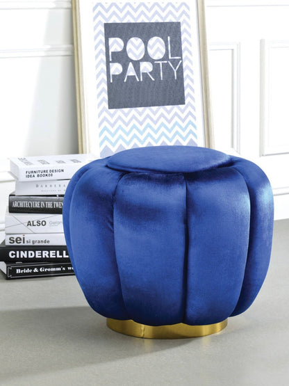 This Heiress ottoman is fully padded with sapphire blue velvet & has a metal round base in a gold finish. This design will go well with any home décor.