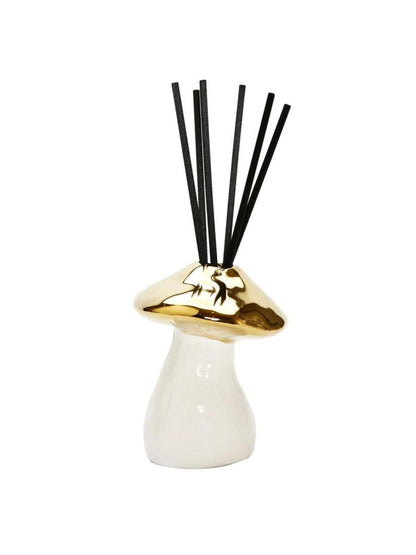 Luxury White and Gold Ceramic Mushroom Shaped Reed Diffuser with fresh floral fragrance of lily of the valley. 