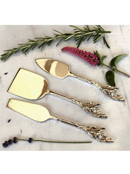 These cheese serving knives have a beautiful olive branch detail on the handle. 3 different knives make up this versatile set to place on each corner of the serving tray along with the cheeses and hors d'oeuvres at your next get together. Sold by KYA Home Decor