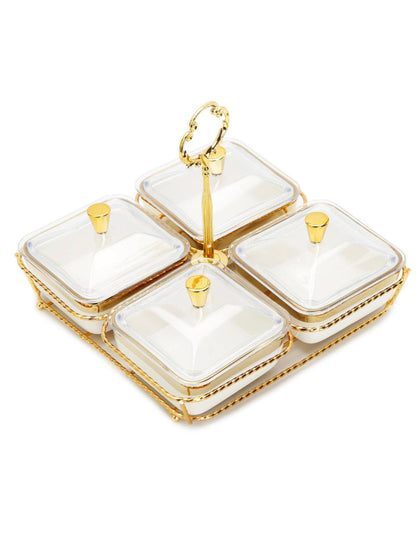 Bring sheer elegance to the table with this porcelain relish dish featuring 4 bowls on a gold base. Its brilliant, white body is enhanced by an elegant gold sculpting along the base and middle. It includes covers to ensure a spill-free serving experience