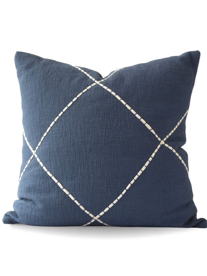 The Claro Criss Cross Embroidered 22x22 Pillow Cover has a clean, crisp 100% cotton texture and embroidered criss cross pattern making perfect for any space. Available in 2 Colors Sold by KYA Home Decor   