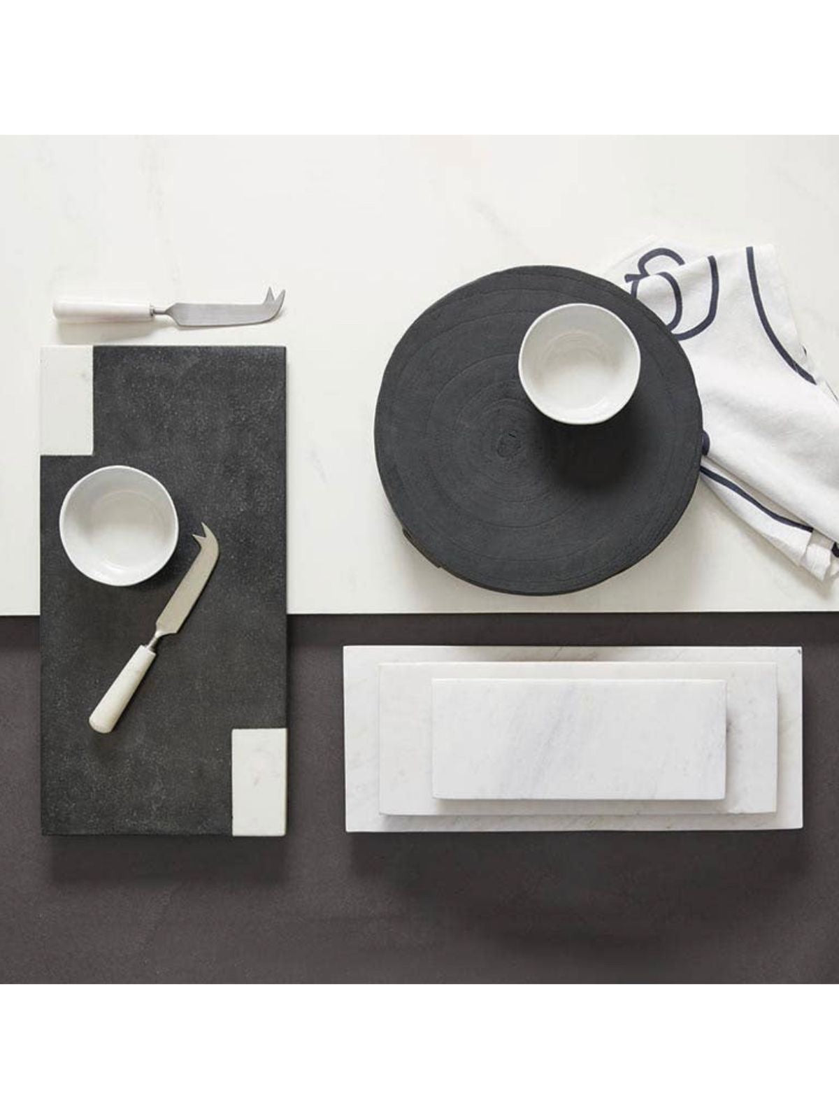 This classic black + white 18in marble tray is the perfect way to display your favorite treats, savory selections, or add a touch of elegance to any room décor. Sold by KYA Home Decor