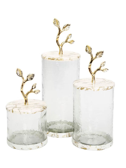 Luxury glass canisters with marble design and beautiful leaf details on lid. Available in 3 sizes, sold by KYA Home Decor.