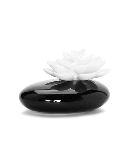 Dispense the scent of oils into the air with this Black Diffuser with White Dimensional Flower.