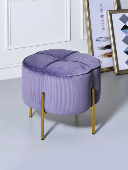 This Bergia ottoman features straight gold metal legs and fully padded seat in velvet fabric with a ribbed pattern, it showcases a modern appearance  that will sure to grab glances.