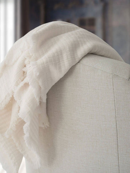 100% Cloud Gauze Cotton Throw Blanket with Frayed Edge in cream color Sold by KYA Home Decor.