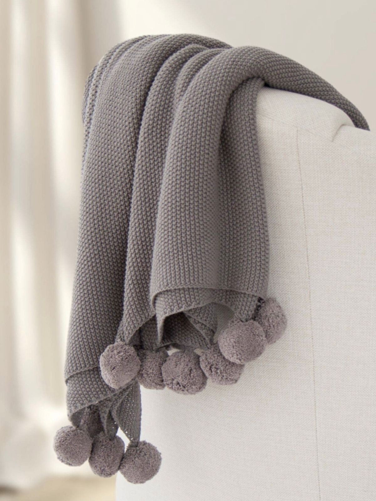 100% Cotton Seedstitch Throw Blanket with Pom Poms in Luxurious Grey Color, 50W x 60L. 