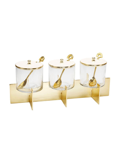 Glass Canister Set on Stainless Steel Gold Block Base with White Marble Lid and Spoons.