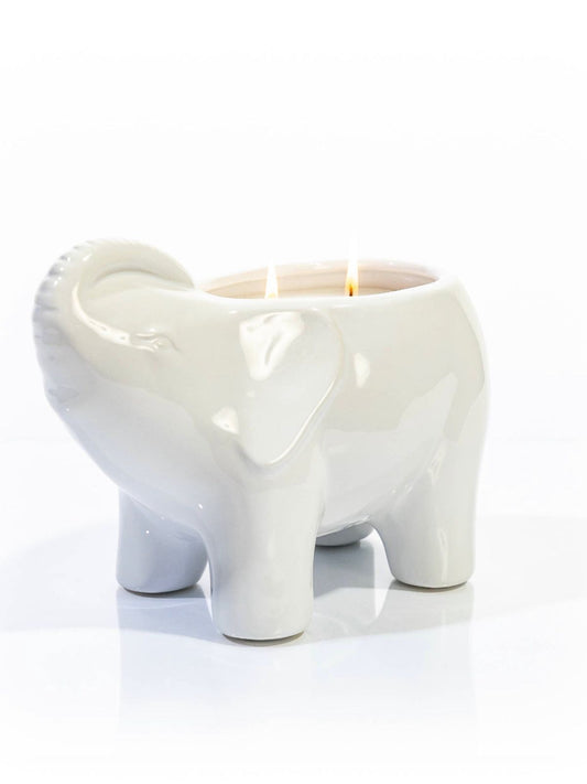 This elegant white elephant candle is designed and finished by hand sculpting the ceramic of each vessel. These candles are then hand filled with a proprietary soy wax blend, all natural essential oils, and 2 cotton wicks to provide a clean burn.  
