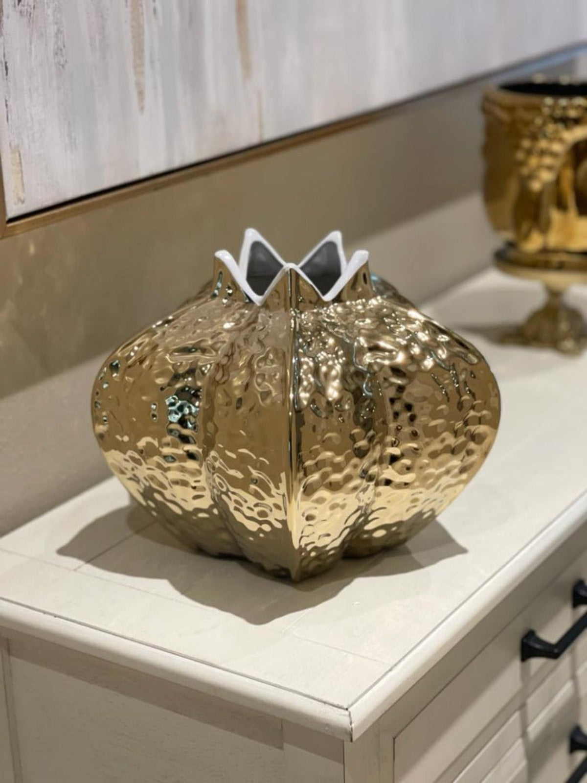 This Stunning Gold Pomegranate Vase with White Rim are elegantly crafted to beautify your home decor. These unique gold vases have a fun shape and look so beautiful with your favorite faux florals!