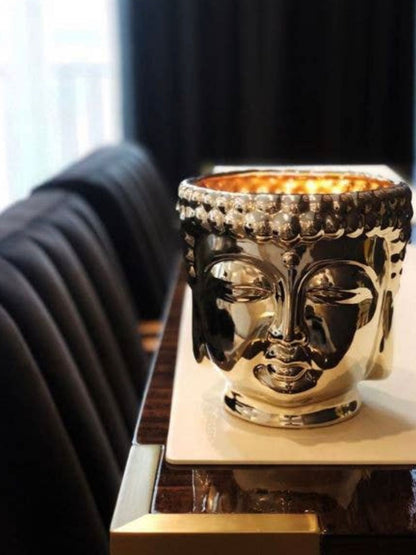 This Metallic Buddha scented candle is hand-sculpted and hand-poured in the USA with only the finest essential oils. 