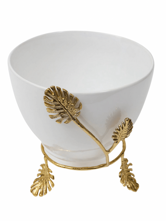 Stunning white ceramic serving bowl on a beautiful gold leaf base sold by KYA Home Decor.