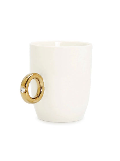This is a gorgeous white and gold coffee mug with beautiful gold handle. Its gold ring handle and clear crystal detail is sure to become a favorite on your coffee station.  