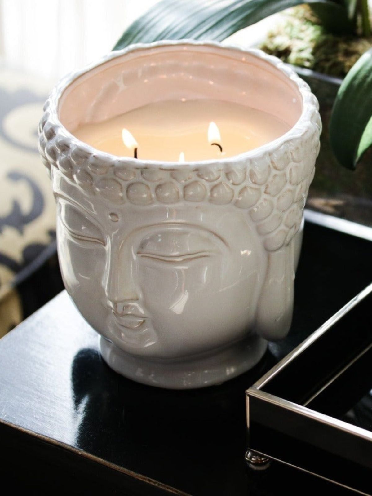 This White Buddha scented candle is hand-sculpted and hand-poured in the USA with only the finest essential oils. 