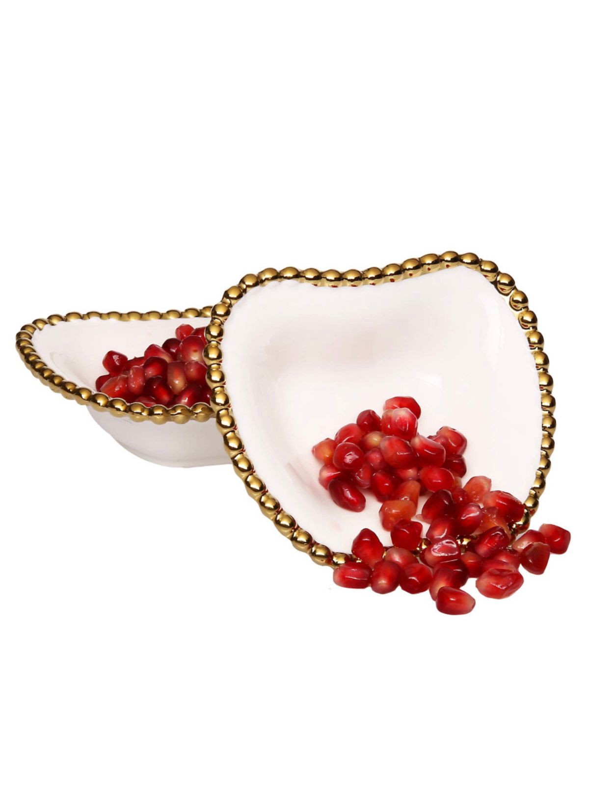 Mother Nature's designs are sweet and inviting. This apple shaped dish features a gold beaded edge on fine white porcelain material. Eco-chic and unique, these bowls are useful for fruit chunks, chocolates, and candy. 