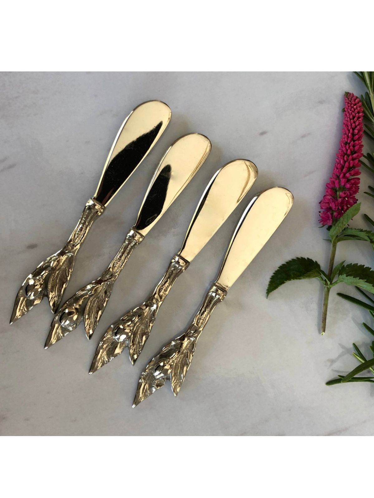 Stainless Steel Spreaders with Olive Branch Designed Handles Sold by KYA Home Decor.