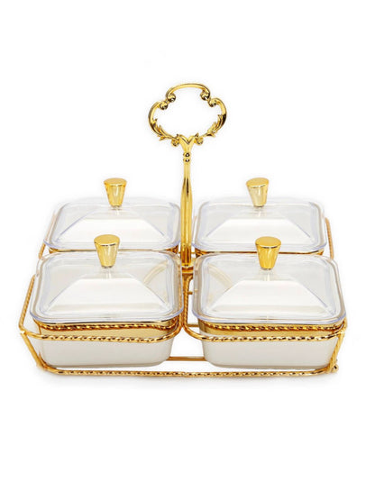 Bring sheer elegance to the table with this porcelain relish dish featuring 4 bowls on a gold base. Its brilliant, white body is enhanced by an elegant gold sculpting along the base and middle. It includes covers to ensure a spill-free serving experience