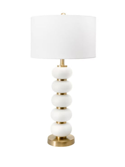 Gold Metal Table Lamp with White Oval Bead Design on Stem.