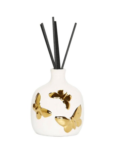 Luxury White Ceramic Reed Diffuser with Gold Butterflies Design and fresh floral fragrance of lily of the valley. 