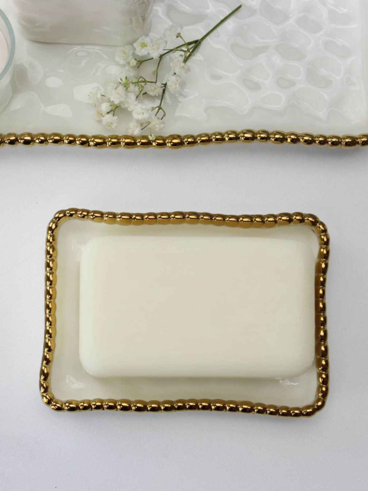 White Porcelain Soap Dish with Gold Beaded Edges.