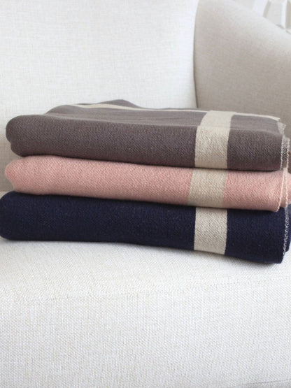 100% cotton stripe knit throw with equestrian criss-cross pattern fully reversible sold in 3 colors.