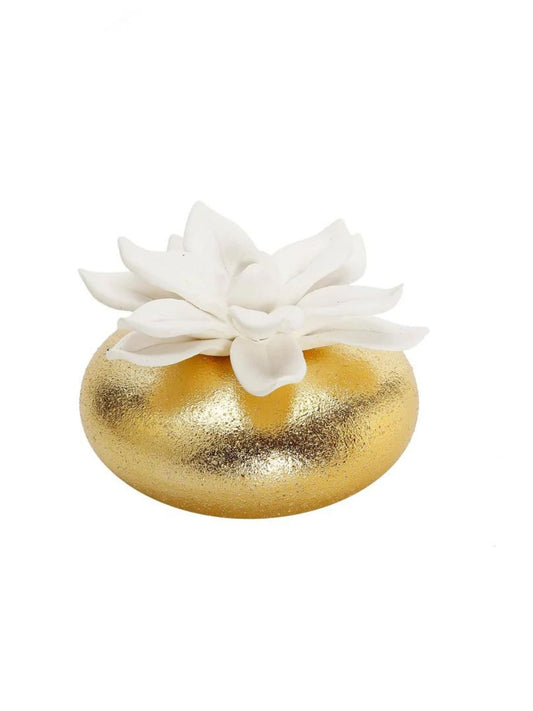Luxury matte gold porcelain diffuser with white dimensional floral topper that diffuses an Irish and Rose fragrance.